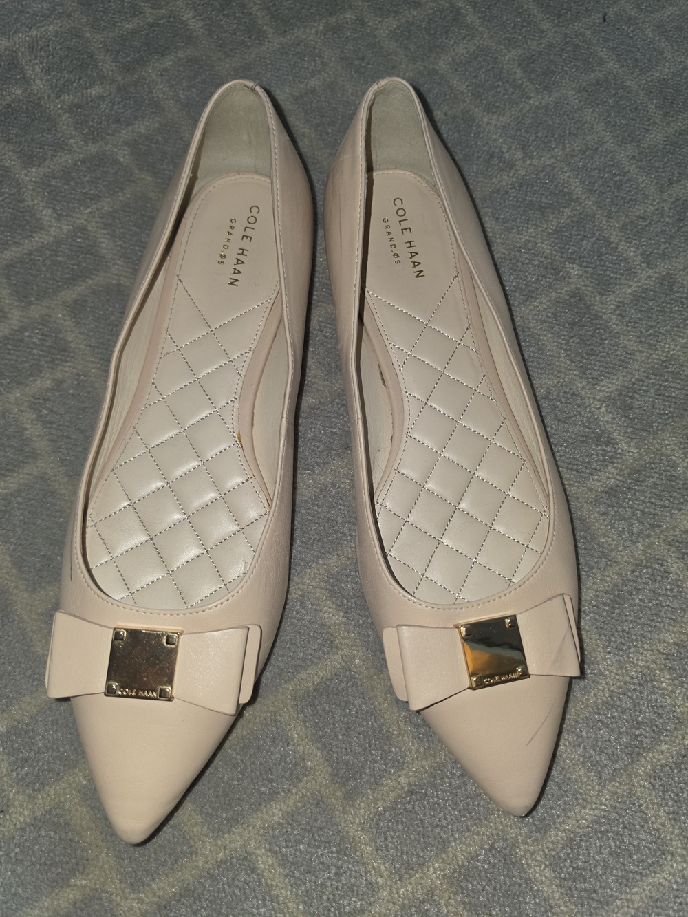 Cole Haan Beige Pointed-Toe Ballet Flats with Bow & Gold Plaque